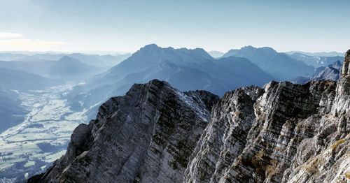 Scenic view of snowcapped mountains against sky