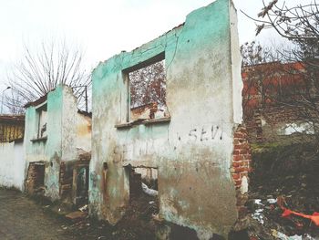 Abandoned house against sky