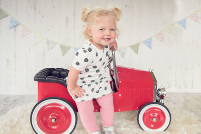 Portrait of smiling girl standing