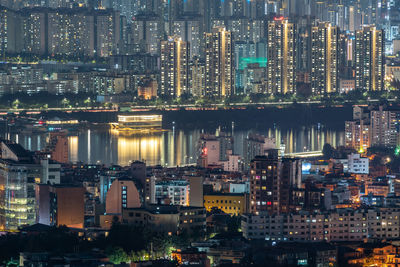 Illuminated cityscape at night