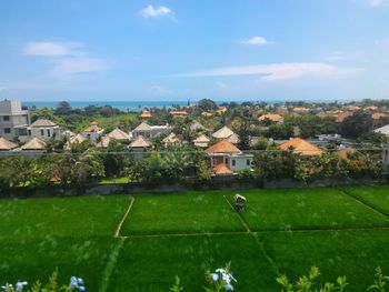 High angle view of houses by sea