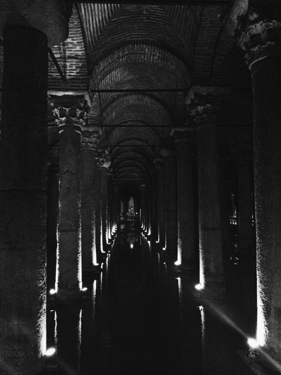 the way forward, indoors, architecture, built structure, corridor, diminishing perspective, narrow, vanishing point, arch, in a row, empty, building, alley, building exterior, walkway, long, day, archway, architectural column, incidental people