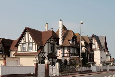 Houses against clear sky