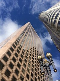 Low angle view of modern buildings against sky