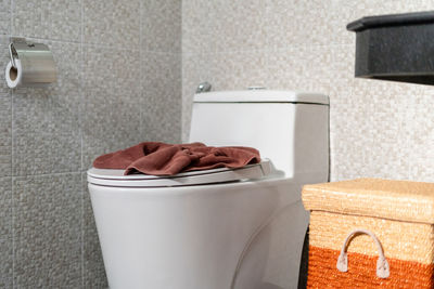 Close-up of toilet seat at bathroom