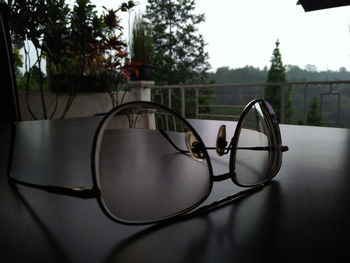 Close-up of sunglasses on table