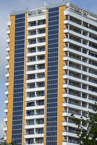 Low angle view of buildings in city against sky