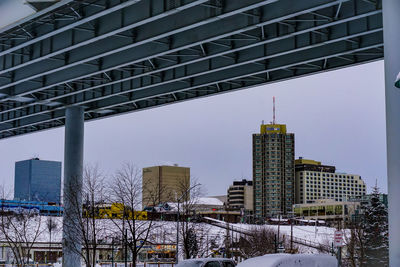 Modern buildings in city during winter