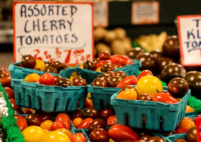 Various cherry tomatoes for sale at market