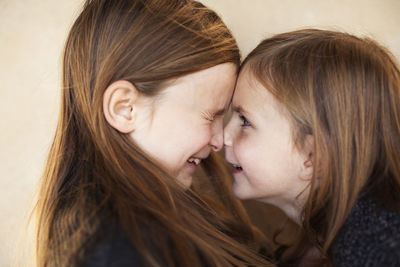 Portrait of two girls enjoying together