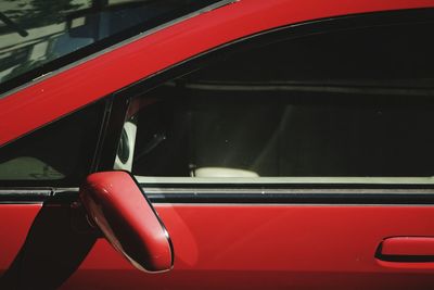 Close-up of red car window