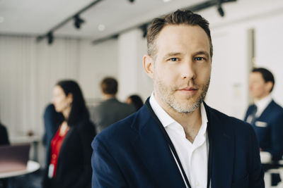 Portrait of confident businessman in office