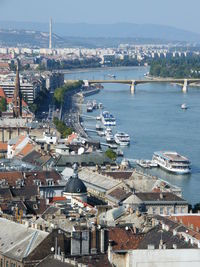 High angle view of river amidst buildings in town