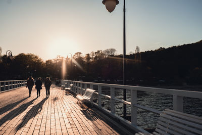 People walking on bridge