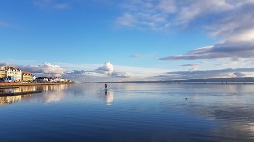 Scenic view of sea against blue sky