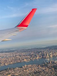 Aerial view of cityscape against sky