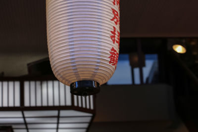 Low angle view of illuminated lamp