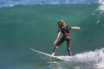 Man surfing in sea