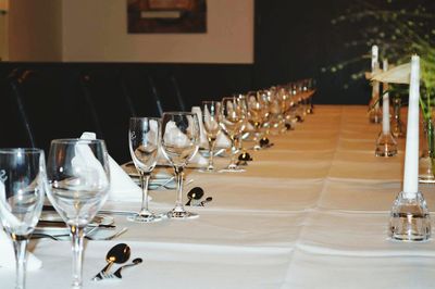 Empty glasses arranged on table