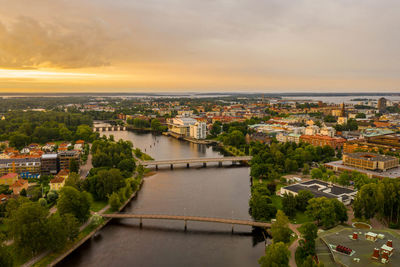 High angle view of river amidst buildings in city