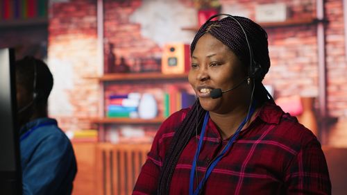 Portrait of young woman standing outdoors