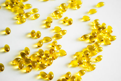 Close-up of pills on white background