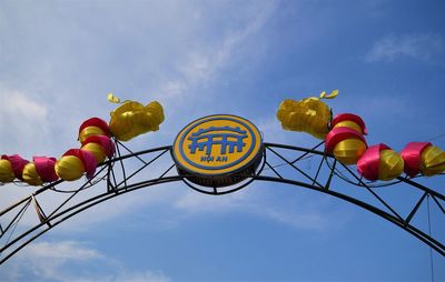 Low angle view of balloons against sky