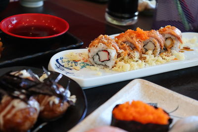 Close-up of sushi served on table