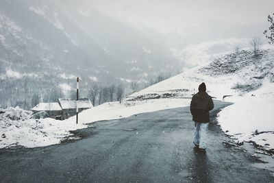 Scenic view of snow covered mountains