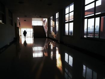 Man standing in corridor