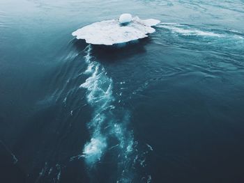 High angle view of glacier in sea