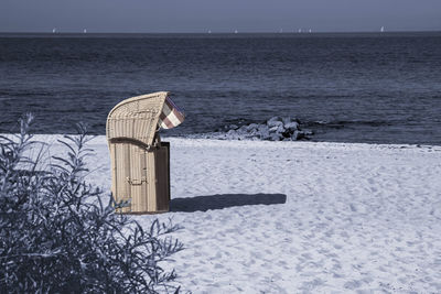 Scenic view of sea against sky during winter