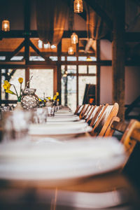 Plates arranged on restaurant tables