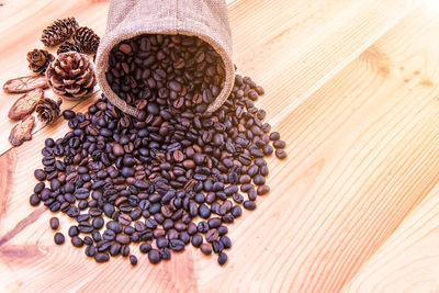 Close-up of coffee beans on table