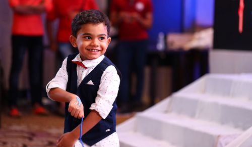 Portrait of smiling boy standing