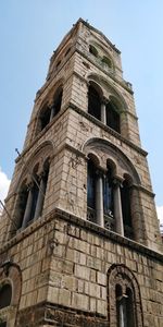 Low angle view of old building against sky
