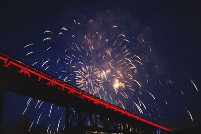 Low angle view of firework display