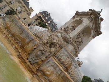 Low angle view of statue in city