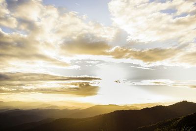 Scenic view of mountains against sky during sunset