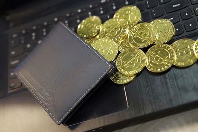 High angle view of coins on table