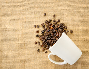 High angle view of coffee beans on table