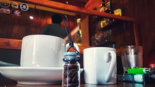 Close-up of coffee cup on table