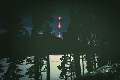 Illuminated street light at night