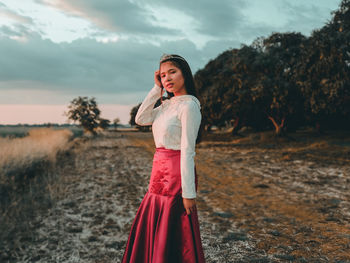 Woman standing on field