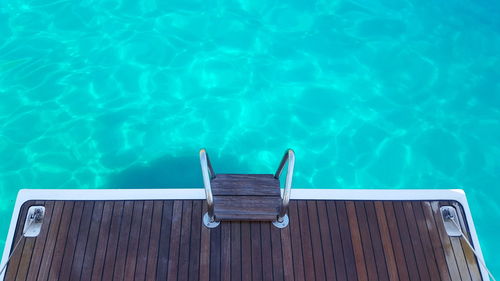 High angle view of railing on yacht in sea