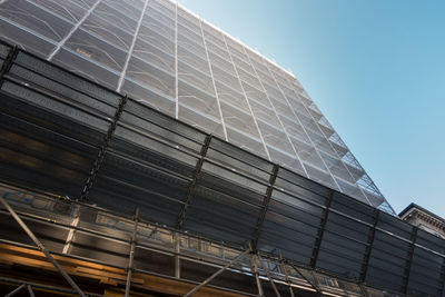 Low angle view of modern building against clear sky