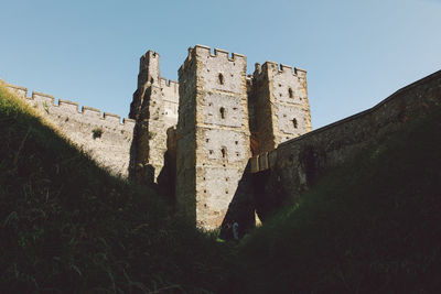 Low angle view of arundel castle against clear sky