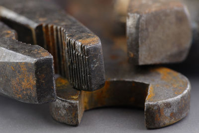 Close-up of old hand tools on table