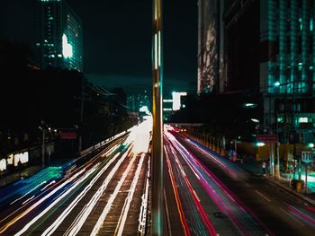 Light trails on city street at night