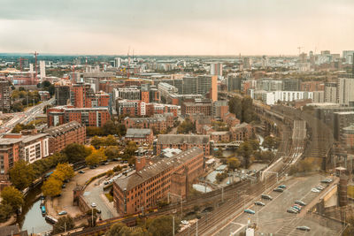 High angle view of street amidst buildings in city